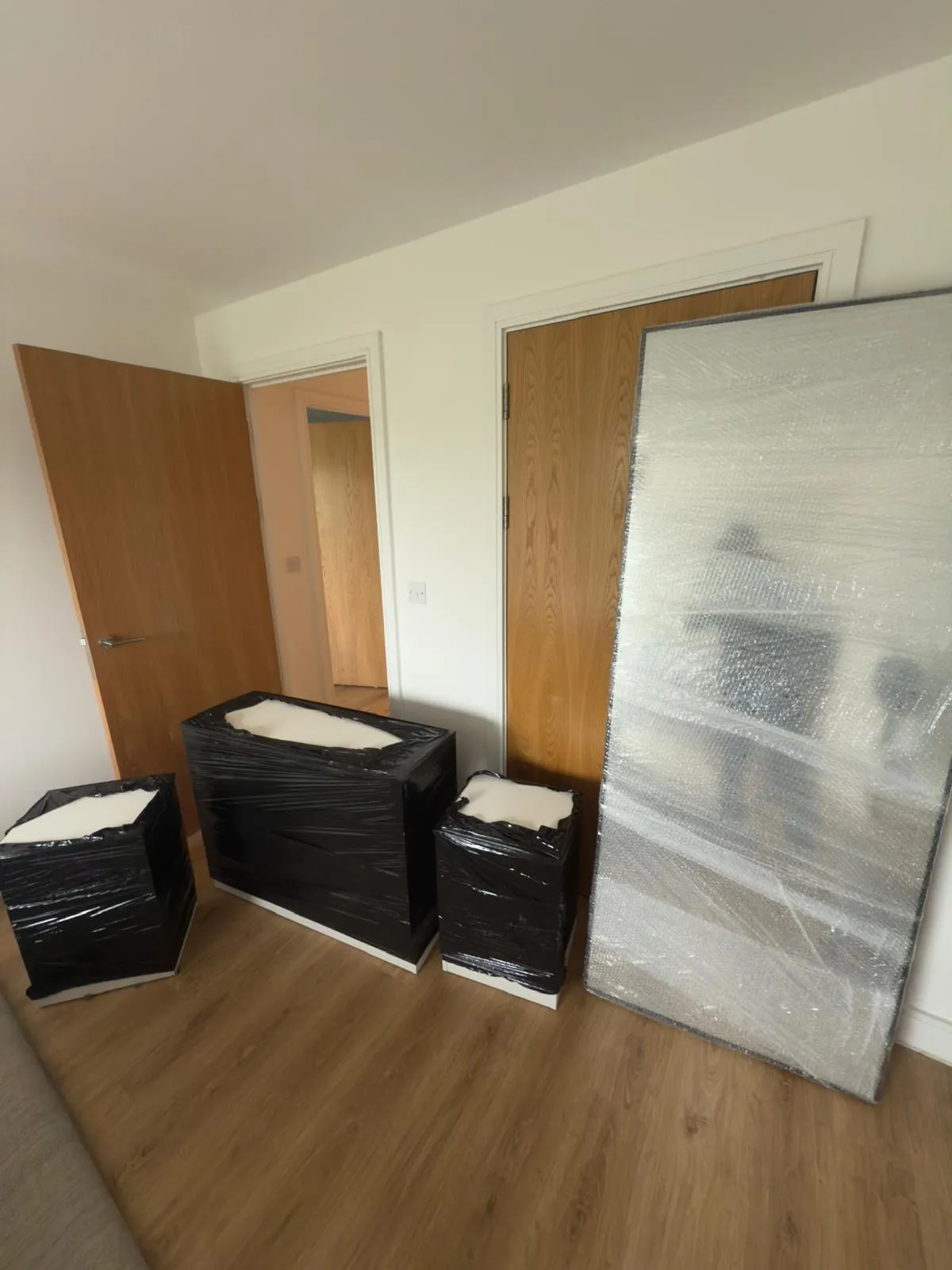 Boxes and a desk ready for a student house move